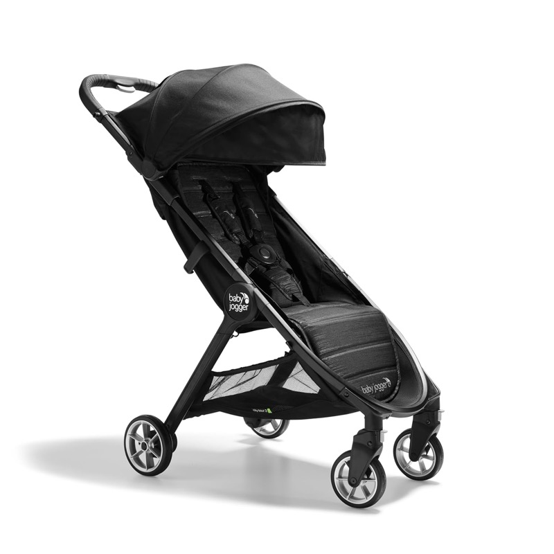 black baby jogger city tour 2 compact stroller with a canopy and a basket under the seat