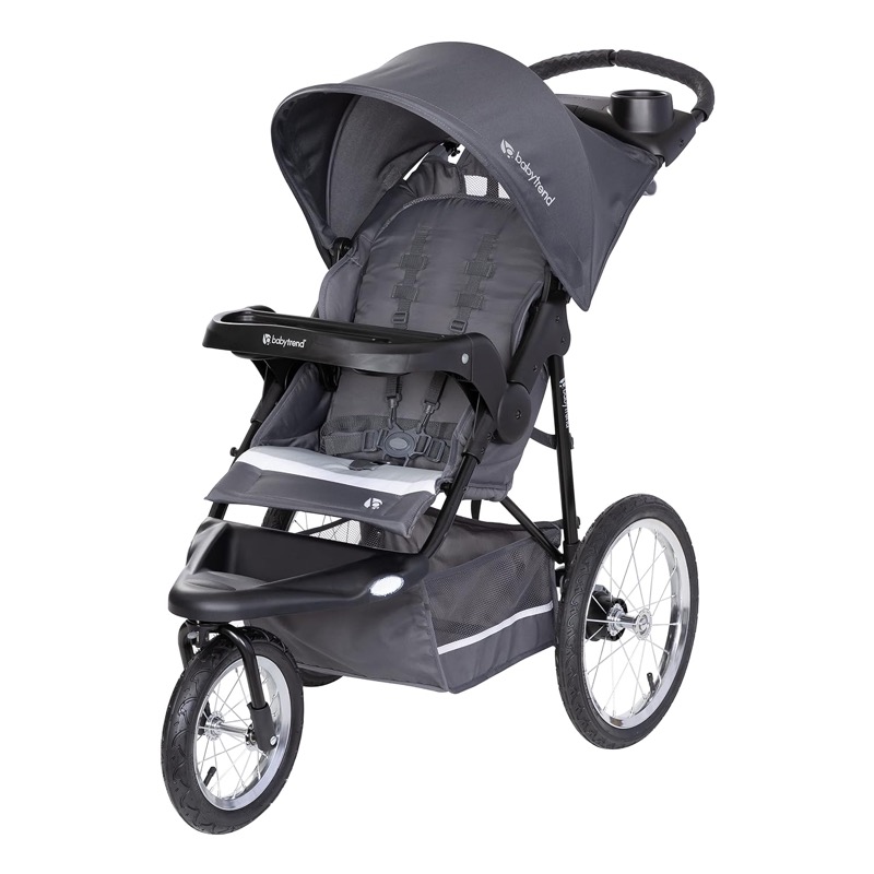 gray baby trend expedition three-wheel jogging stroller with large bicycle tires and a canopy