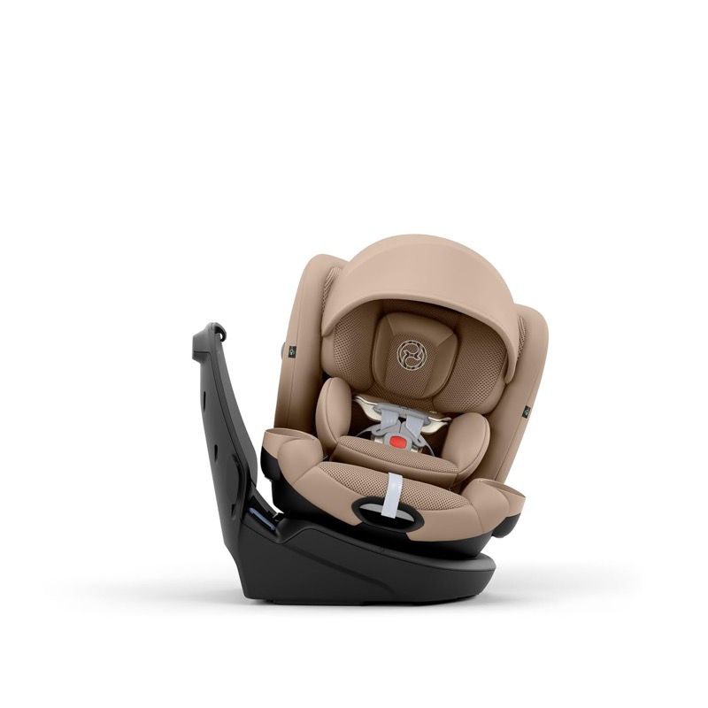 beige cybex callisto g 360 rotating car seat with a canopy on a swivel base