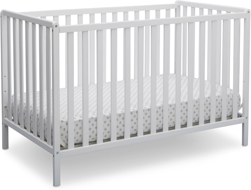 white delta children heartland convertible crib with a flat top rail and slatted sides