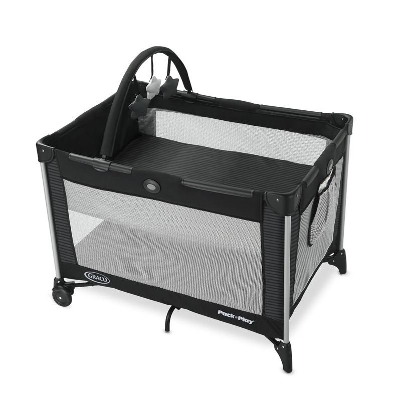 black and gray graco pack n play play yard with a raised bassinet insert and a toy bar