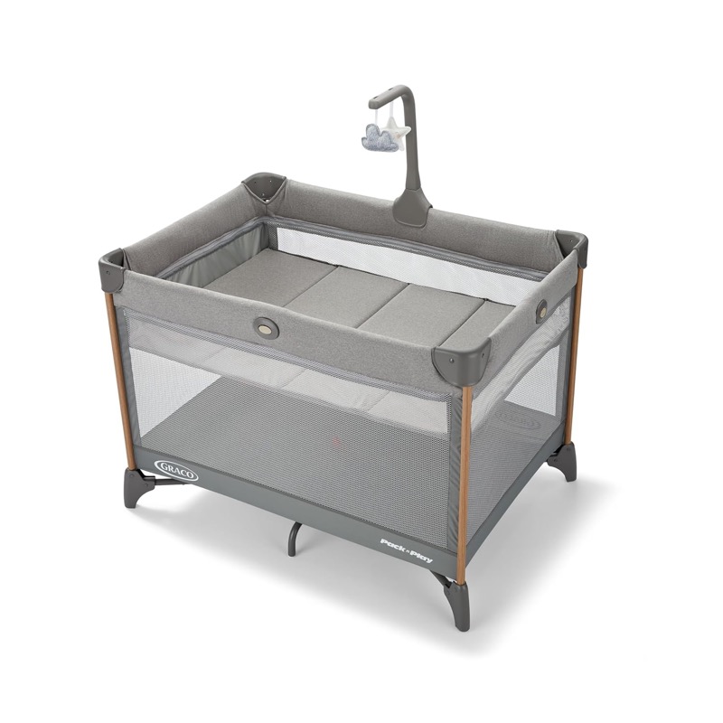 gray graco pack n play on the go zip dlx play yard with a zip-in raised bassinet