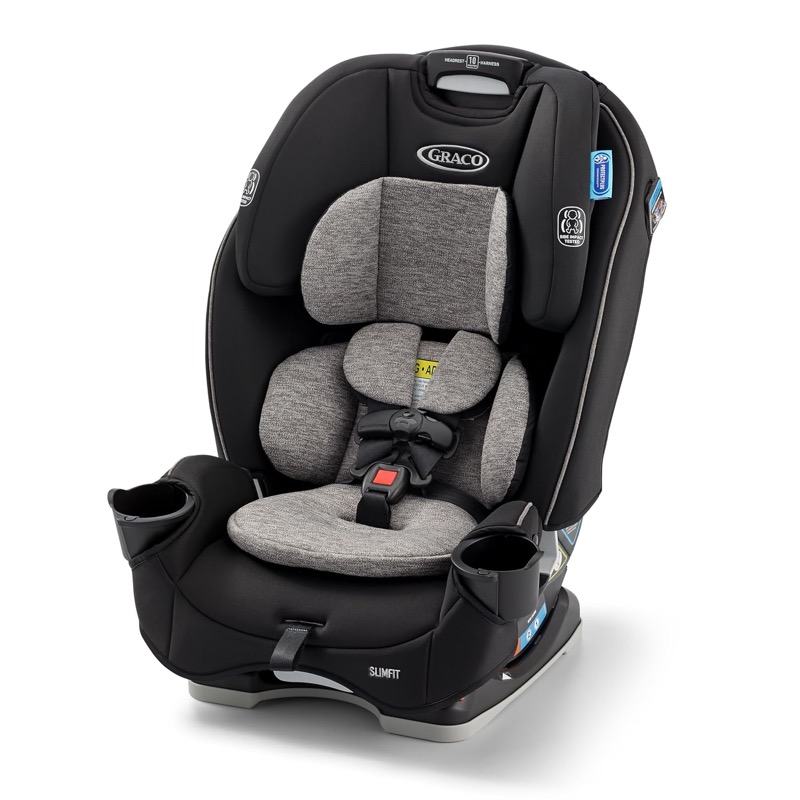 black and gray graco slimfit three-in-one car seat with a padded infant insert and cup holders on both sides