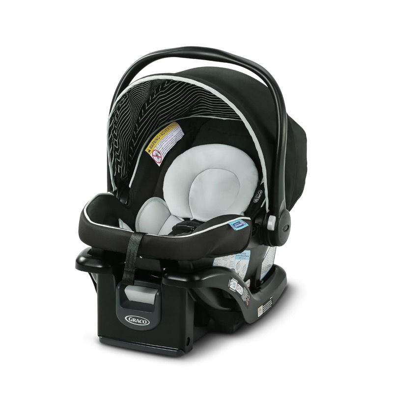 black graco snugride lite lx infant car seat with a carry handle and gray seat insert