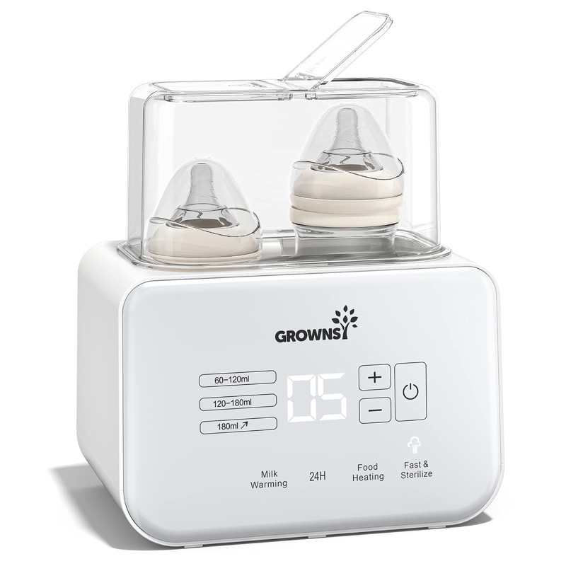 white grownsy double bottle warmer with two baby bottles under a clear lid and a digital panel